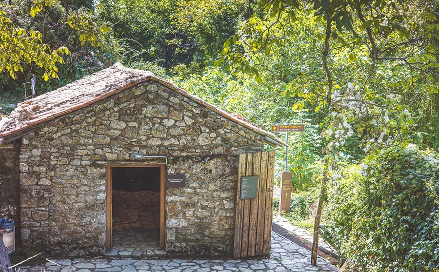 A small stone chapel among trees