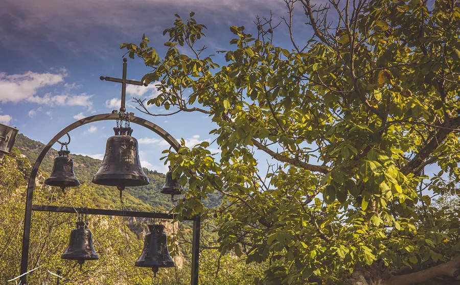 Bells hanging in a monastery courtyard