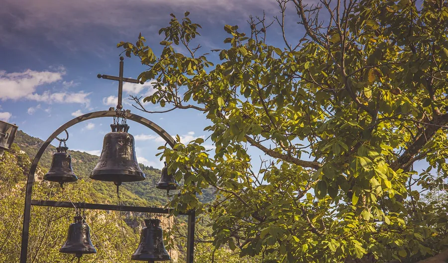 Bells hanging in a monastery courtyard