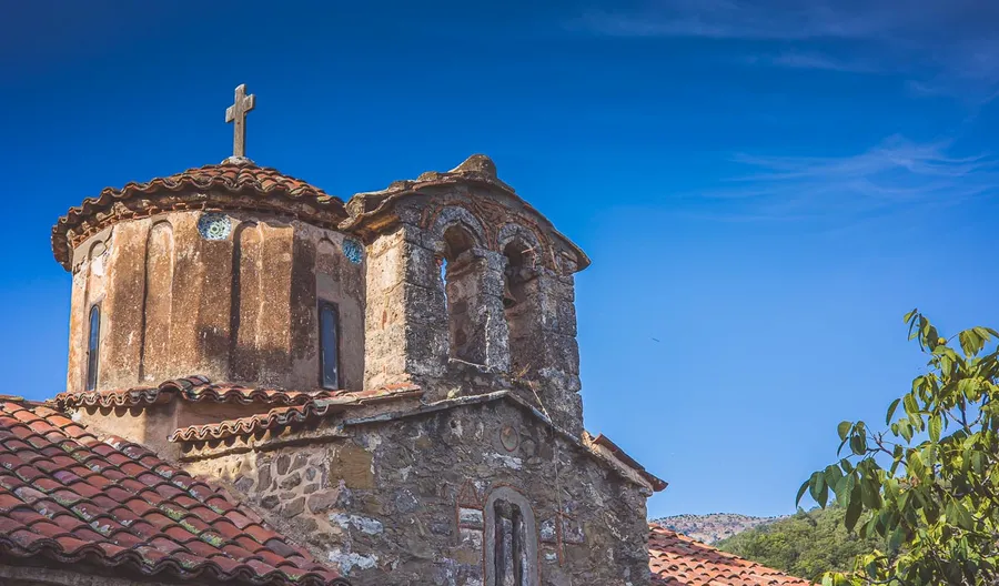 A domed Byzantine church against a blue sky