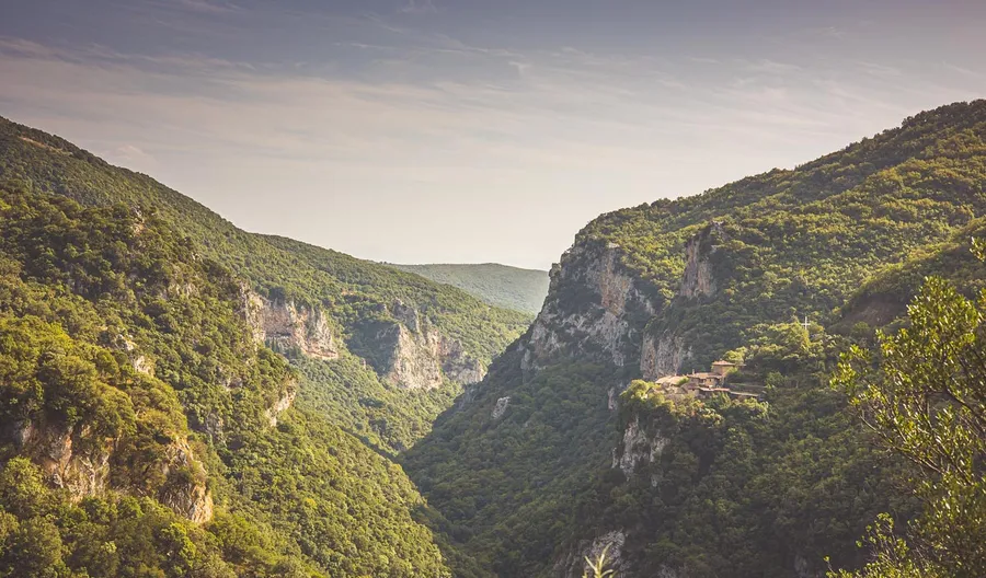 The walls of the Lousios gorge in warm light